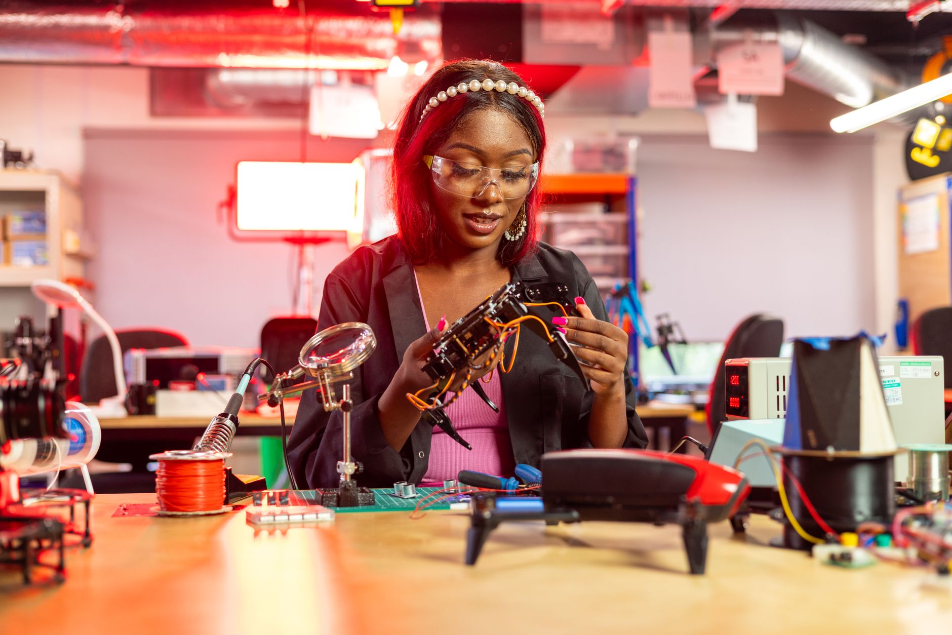 Creative professionals collaborating on futuristic technology, embodying the spirit of modern innovators.